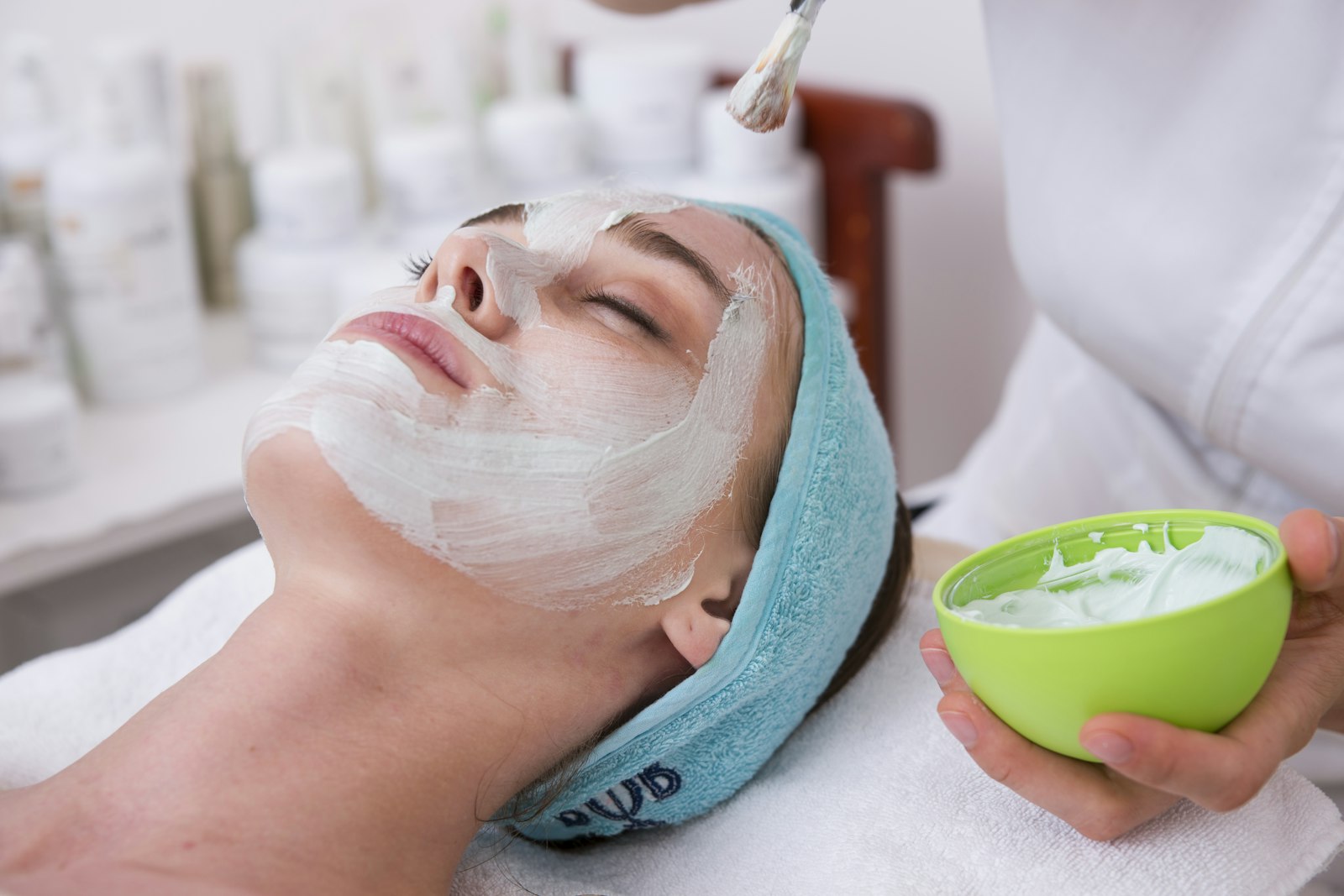 A client receiving a facial mask treatment