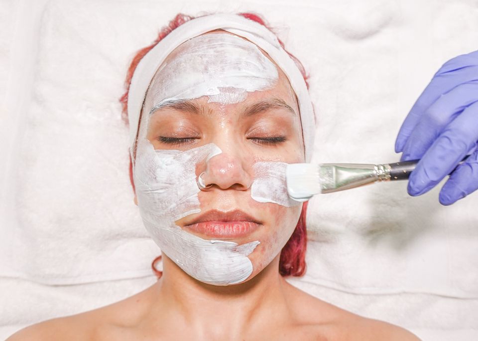 Facial application with a brush